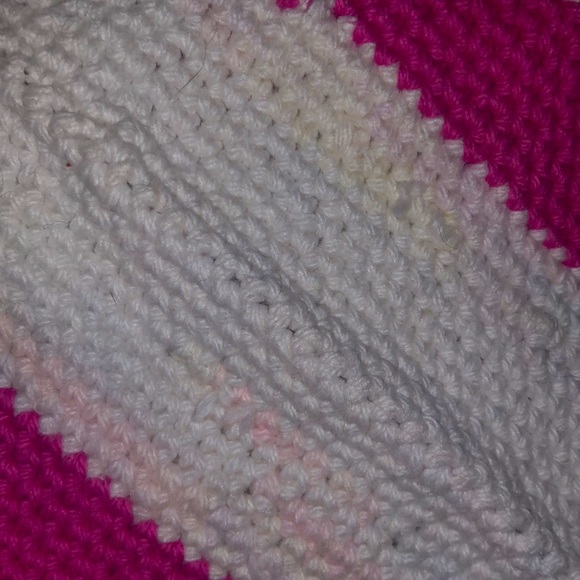 One pair of pink, purple, green, white, and blue striped potholders - Picture 7 of 7